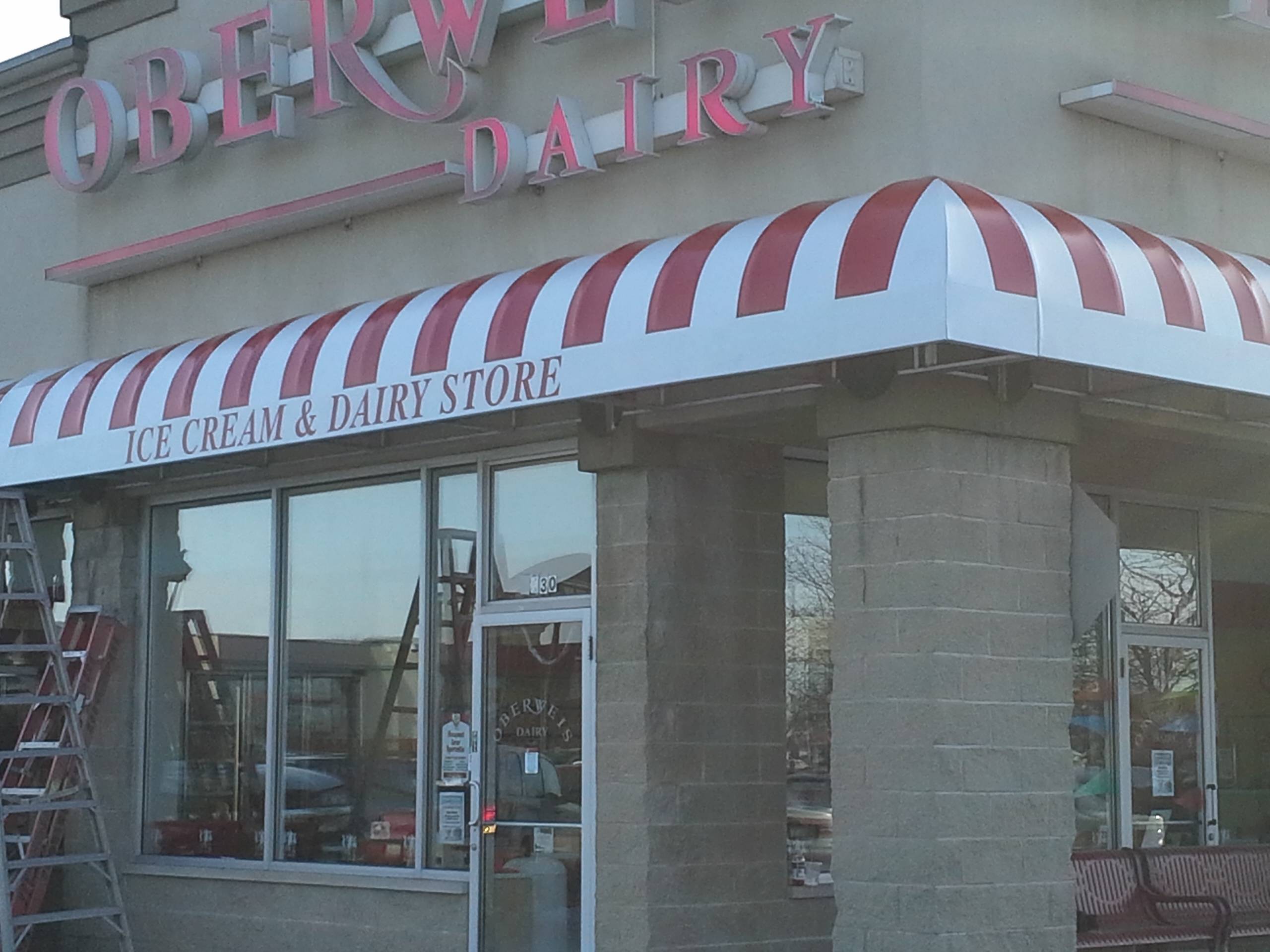 Branded awning install — Oberweis